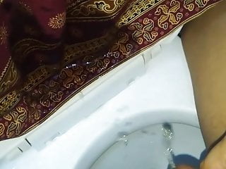 Pissing again on mother in law lungi