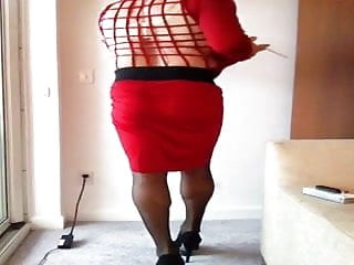 Big boob cross dresser smoking red dress. 