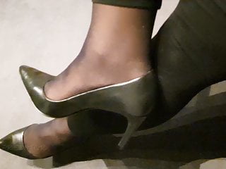 Putting on some black Buffalo leather heels
