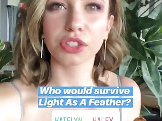 Katelyn Nacon outside in a blue dress, nice cleavage