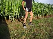 Wanking in black Adidas Sprinter Shorts in the fields