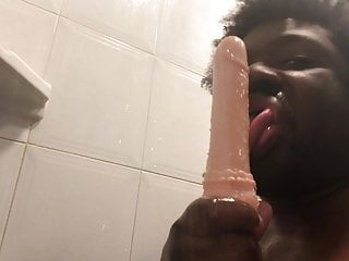 Sucking a didlo in the shower...