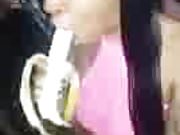 Girls eat banana in a sexual way.mp4