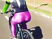 Shiny spandex sexy women in bike