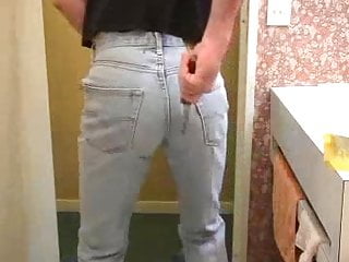 Guy Ripping And Tearing His Pale Bue Levi 501 Jeans...