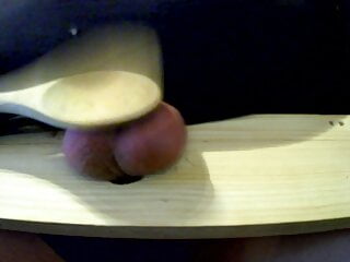 Ballbusting with wooden spoon...
