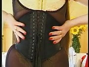 extremely tight tightening of two corsets 