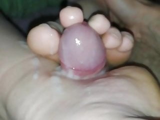My pregnant wife footjob with cumshot