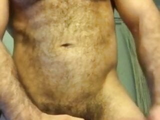 Sexy hairy muscle hunk jerks off...