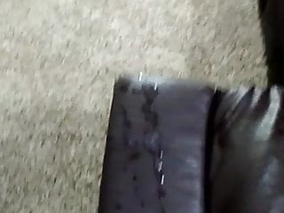 Cumming on leather sofa