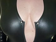 UK MILF pops out her huge tits from tight catsuit