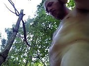Amateur guy pissing in the woods