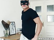 Masked jock unveils his athletic body while tugging his cock