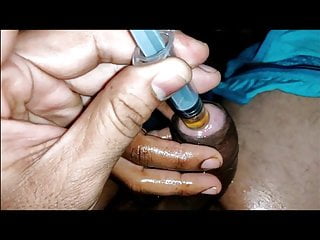 Hubby and wife nude injecting oil...