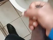 Horny Tamil guy jerking in office urinal