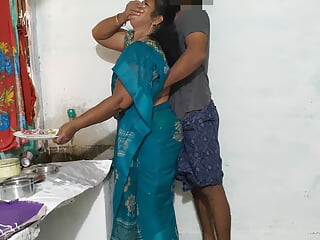 Aunty was cleaning the dishes in the kitchen wearing a saree and I went behind her and tied her up and had sex with her.