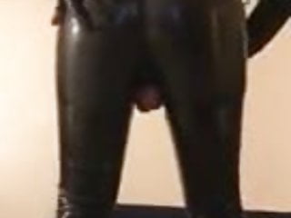 Rubber sissy showing off its slutty rubber ass