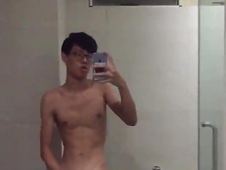 Asian twink wanking his 21...