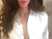 Transsexual dressed in satin blouse 