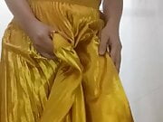 Wetting and Cumming Wearing Shiny Gold Pleated Skirt