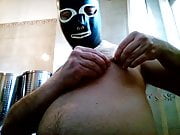 Kocalos - I wear a latex mask and pierce a nipple