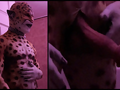Clyde the Rubber Leopard stroking his big pierced cock.