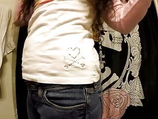 Curly haired girl farting in jeans