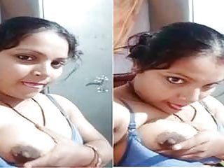 Horny Desi Bhabhi Sucking Her Boobs...