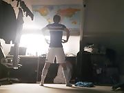 Twink shaking his ass in football kit