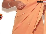 Mother wearing a yellow saree, video