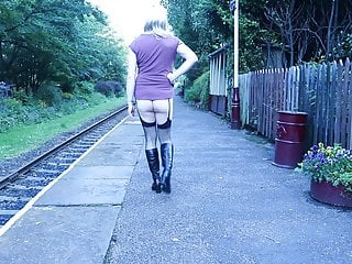 Crossdressed ooudoors on railway platform...
