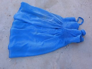 Pissing on blue dress...