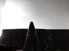 perv Latexnun is sitting on giant assplug
