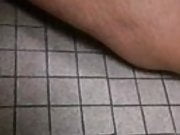Public restroom understall cumshot