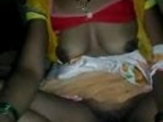 Tamil aunty giving oil her husband...