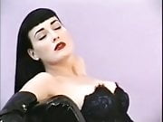 Dita Von Teese poses in corset