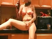 Fucking her on the kitchen counter