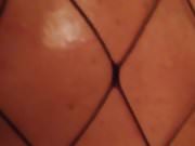 Oiled Nipples Fishnet Catsuit