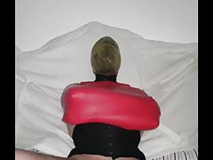 Breathplay latex hood and corseted