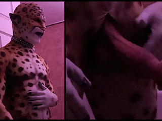 Clyde The Rubber Leopard Stroking His Big Pierced Cock